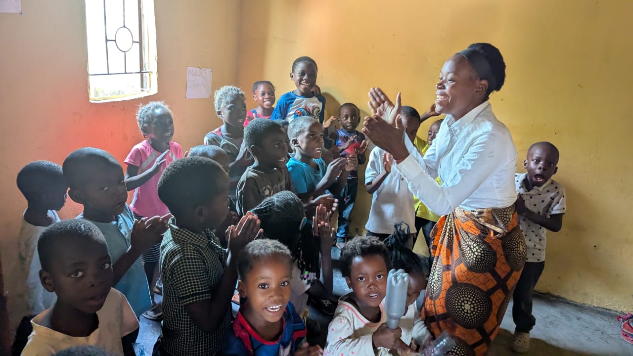Teacher with children